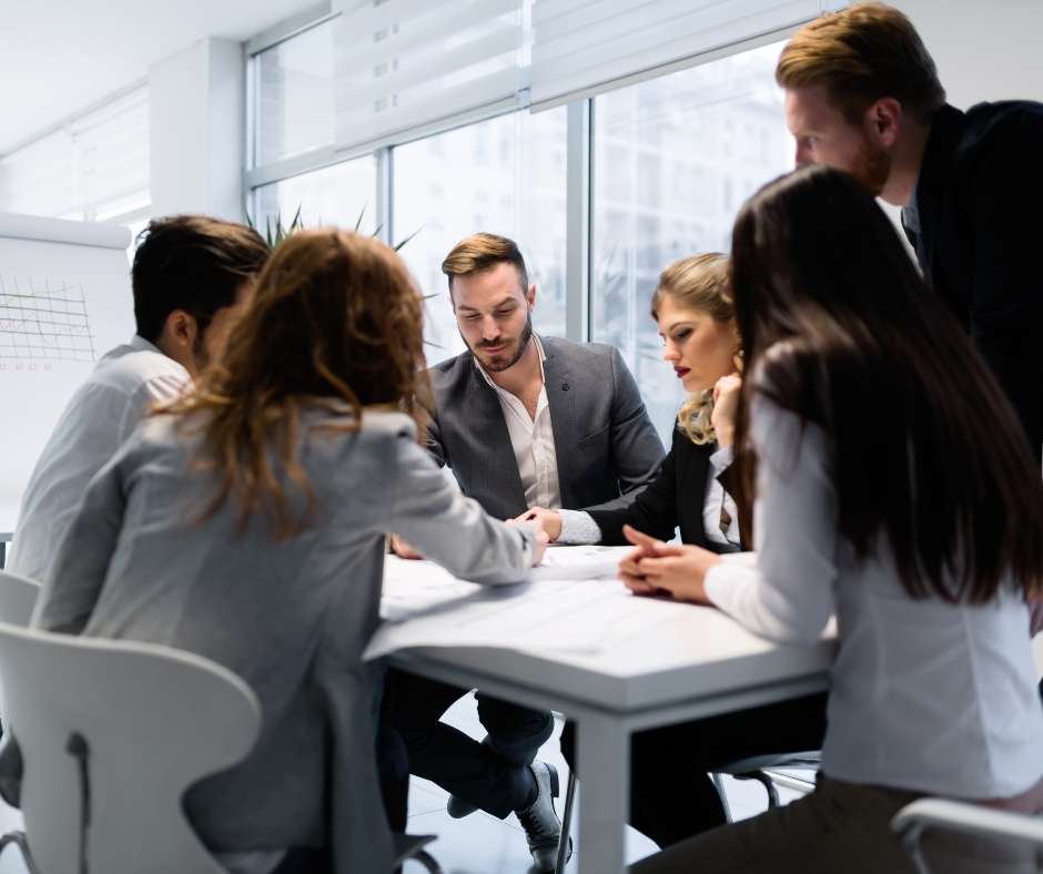 Accounting professionals discussing potential intercompany accounting solutions